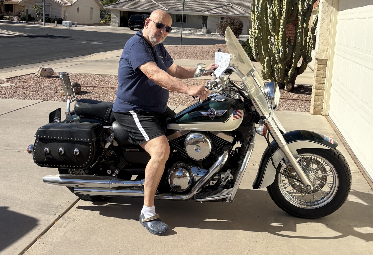Bob Putz delivering his motorcycle donation.